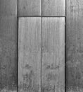 Grey brushed steel door set in a metal wall Royalty Free Stock Photo