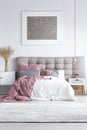 Grey carpet in bright bedroom Royalty Free Stock Photo