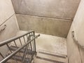 Grey cement stairs or steps and metal railing Royalty Free Stock Photo