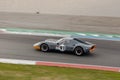 Grey classic car at the TT Circuit Assen circuit