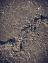 Grey clay, concrete wall with cracks Royalty Free Stock Photo