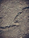 Grey clay, concrete wall with cracks Royalty Free Stock Photo