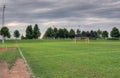 Grey Clouds and Soccer Field Royalty Free Stock Photo
