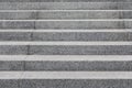 Grey cobblestone stairs in the city, background with grunge texture