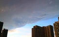 Grey color rain clouds scrolling on the high building