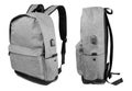 Grey colour backpack side view isolated over white background