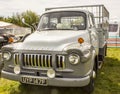 A grey coloured retro pick up truck