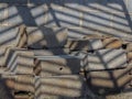 Grey concrete construction blocks - CMU and fence shadows Royalty Free Stock Photo