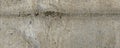 Grey concrete wall. Clay wall texture with cracks and imperfections. Modern interior concept. Royalty Free Stock Photo