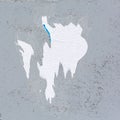 Grey concrete wall with grungy ripped torn poster Royalty Free Stock Photo