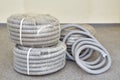 Grey corrugated pipe for the cable