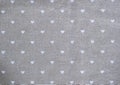 Grey cotton napkin with hearts. decorated background for valentines day