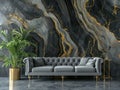 grey couch and plant in front of an abstract wall Royalty Free Stock Photo