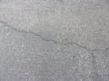 Grey cracked concrete surface in town 1 Royalty Free Stock Photo