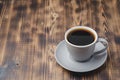 Grey cup with black coffee on on dark wooden table. Selective focus and copy space. Coffee break Royalty Free Stock Photo