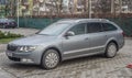 Grey Czech hatchback Skoda Superb parked