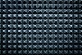 Grey dampening acoustic foam in the vocal recording room