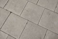 Grey dark paving slabs, concrete tile texture. Royalty Free Stock Photo