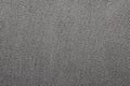 Grey denim background.The texture of denim grey fabric is fluted in light stripes. Royalty Free Stock Photo