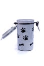 Grey doggy treat container with black pawprints Royalty Free Stock Photo