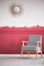 Grey elegant armchair in trendy living room interior with ombre wall Royalty Free Stock Photo