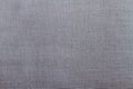 Grey fabric background with interlacing threads. Copy Space