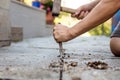 Grey flagstones with stone mason tools