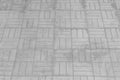 Grey floor tiles abstract mosaic pattern street road city texture background gray stone pavement paving Royalty Free Stock Photo