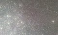 Grey glitter textured background,Bright beautiful shining grey glitter. Royalty Free Stock Photo