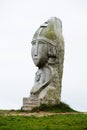 Grey granit statue of baby Samson