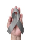 Grey or gray ribbon for Brain cancer and tumors awareness, allergies, asthma control and diabetes prevention Royalty Free Stock Photo