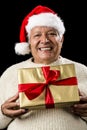 Grey-Haired Man Offering Golden Wrapped Present