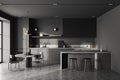 Grey home kitchen interior with cooking and dining area with modern furniture Royalty Free Stock Photo