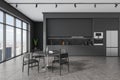 Grey home kitchen interior with eating and cooking space, panoramic window Royalty Free Stock Photo