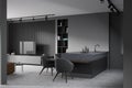 Grey kitchen interior with tv set and table, dining room and lounge zone