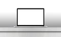 Grey laptop with blank screen on desk Royalty Free Stock Photo