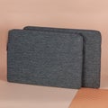 Grey laptop notebook fabric case on beige background