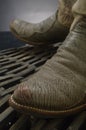 Cowboy boots on welcome mat