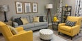Grey living room with sofa, chairs, standing lamp, small table, yellow details and pattern decorations in black and white Royalty Free Stock Photo