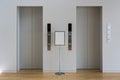 Grey Lobby and Two Lifts Royalty Free Stock Photo