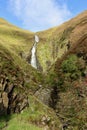 Grey Mares Tail Waterfall viewpoint in Scotland with blue sky Royalty Free Stock Photo