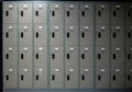 Metal cabinets school or gym with handles and locks in two row Royalty Free Stock Photo