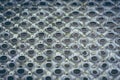 Grey metal mesh grid plain texture. Royalty Free Stock Photo