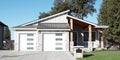 Grey Metal Modern Luxury Real Estate Home House Maison Siding Exterior Garage Blue Sunny Sky Background