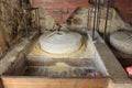 Millstones, grinding grain