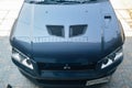 Grey Mitsubishi Lancer evolution VII GT-A CT9A on car workshop parking lot Royalty Free Stock Photo