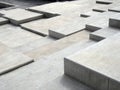 Grey modern geometric cubic concrete steps forming angular patterns and shapes