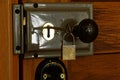 A grey mortise lock has a bakelite door knob, the key is in the key hole Royalty Free Stock Photo