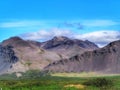 Grey Mountain with blue sky