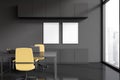 Grey office interior with work zone and laptop, window. Mockup frames Royalty Free Stock Photo